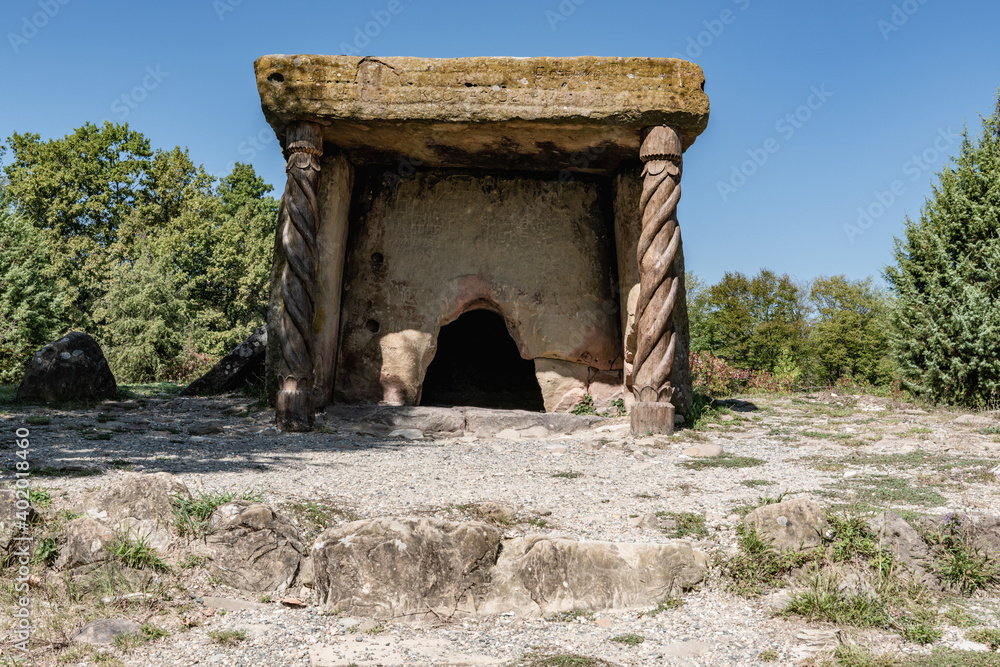 Stone dolmen at the top of the hill with a triangular entrance