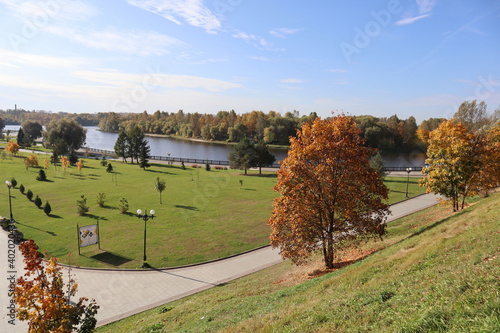Urban landscape - top view of the park and river in sunny weather in autumn - walking in the fresh air 