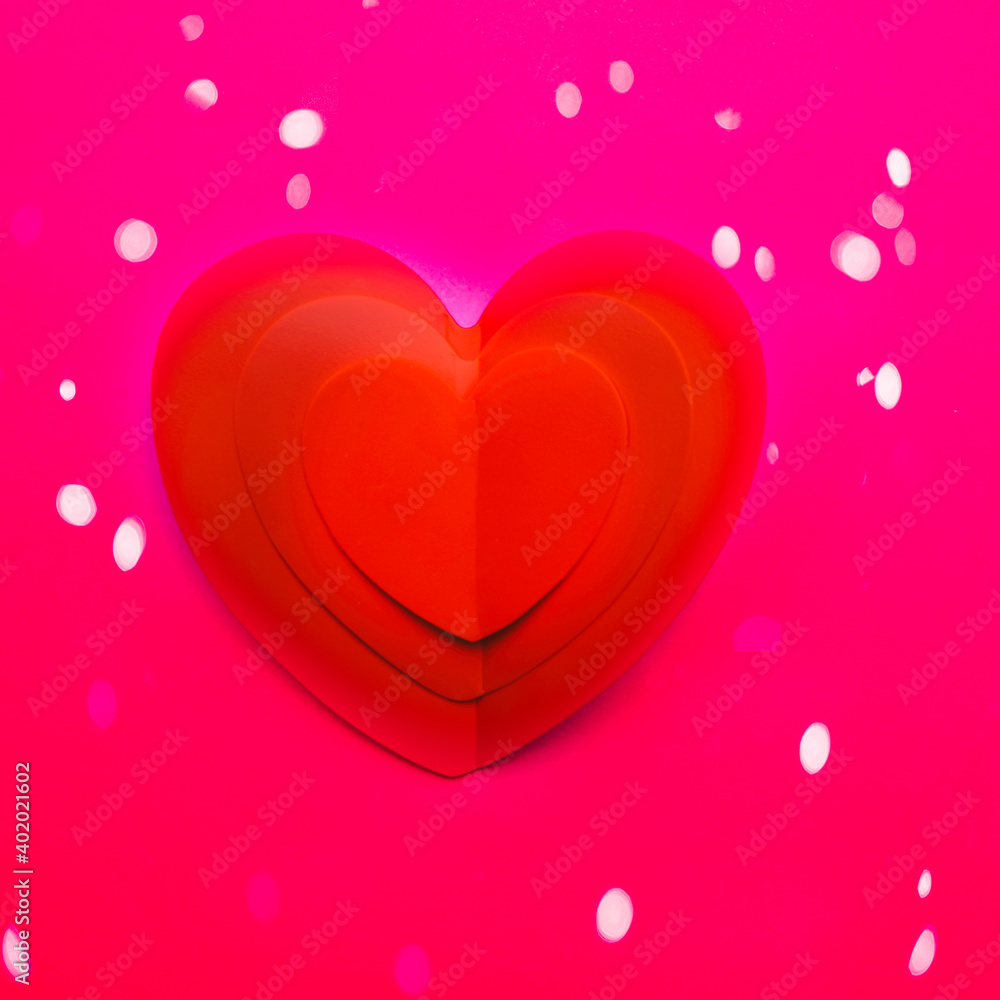 Background with one paper heart origami with festive lights