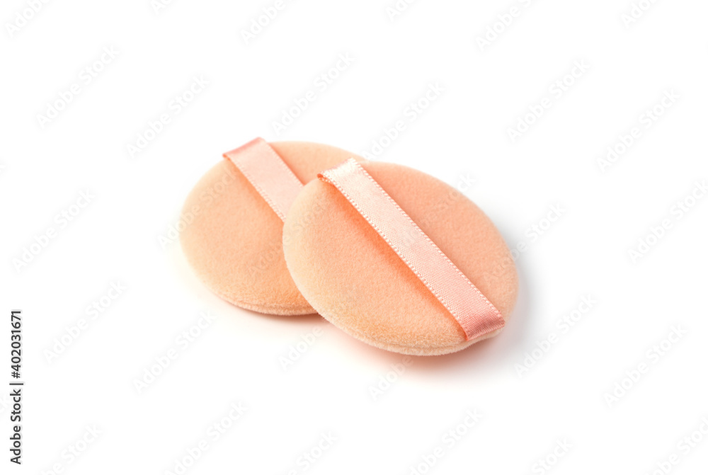 Two powder Sponges on a white background with space to copy. The view from the side. Two powder Sponges on a white background with space to copy. The view from the side.