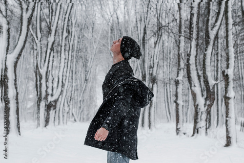 boy in winter forest