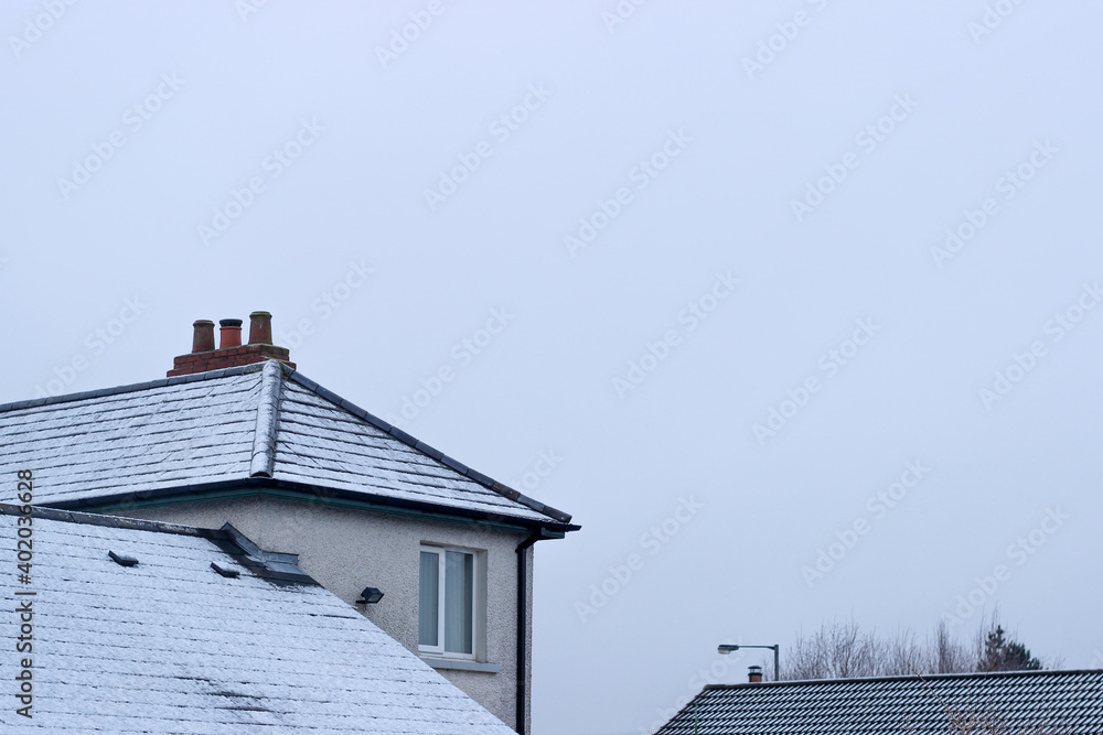 Snowy Rooftops with a white sky backdrop