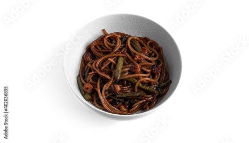 Cellophane with shrimps and vegetables isolated on a white background. High quality photo