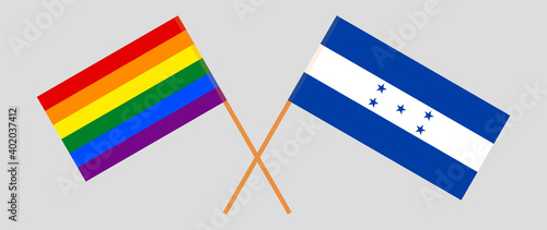 Crossed flags of LGBTQ and Honduras
