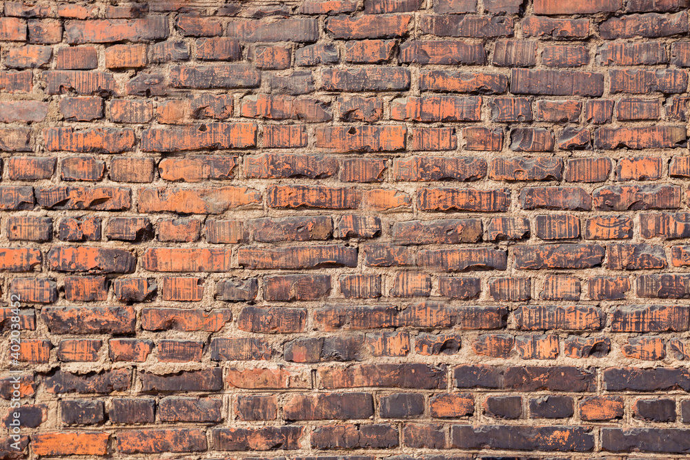 Naklejka premium background of old red brick wall pattern texture.