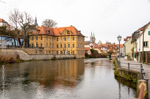 Fototapeta Naklejka Na Ścianę i Meble -  Bamberg, Germany, 20.12.2020. View over the Pegnitz to the famous Villa Concordia and the historic old town. High quality photo