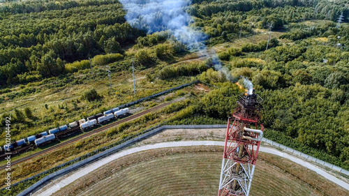 Tableau sur toile A burner for burning associated gas at a petrochemical plant.