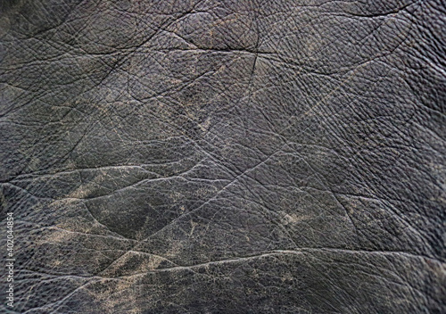 Valokuva black leather texture worn with wrinkles - flat surface background looking like