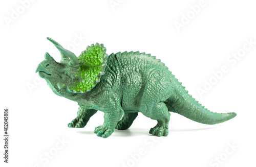 Dinosaur toy isolated on white background, Minaiture dinosaur model © Alisa