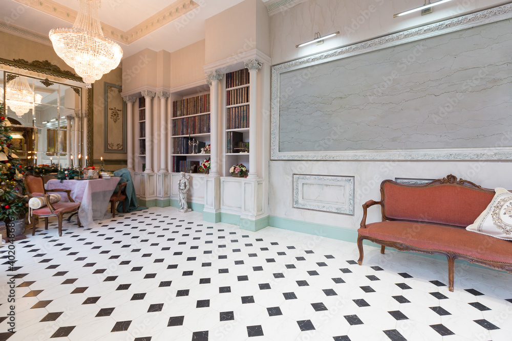 Fototapeta premium New Year's decoration of a gorgeous living room in a luxury classic style