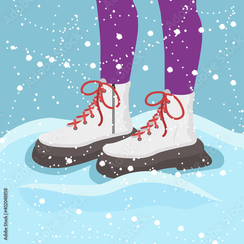 Winter. Legs in winter boots. Winter shoes. Snow, snowdrift.