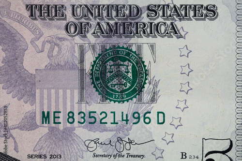 fragment of 5 dollar bill for design purpose
