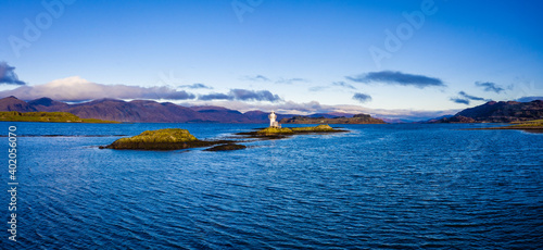 Aerial view of Sager Bhuidhe Lighthouse, loch linnhe and offshore islands on the west coast of the argyll region of the highlands of Scotland during winter