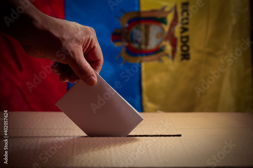 detail of a Latino hand with the ballot in Ecuador