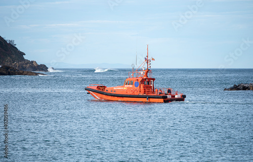 maritime rescue boat leaving the port