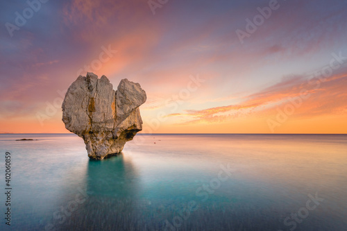 Lonely rock sculpture at the shape of heart, Preveli, Crete, Greece