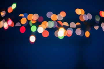 christmas lights on blue holiday background