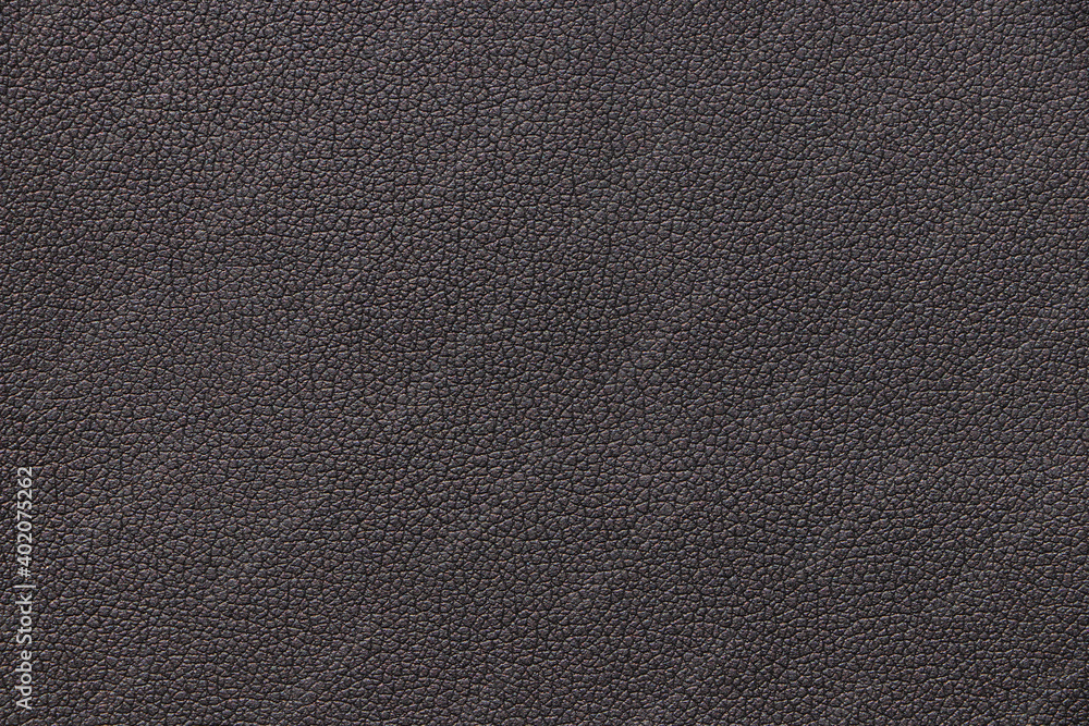 Dark gray genuine leather. Texture and close-up. Dark gray genuine leather. Texture and close-up.