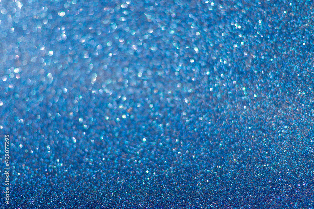 Shiny blue glitter texture background stock images. Texture of blue glitter shiny background. Abstract blue shiny background with copy space for text.