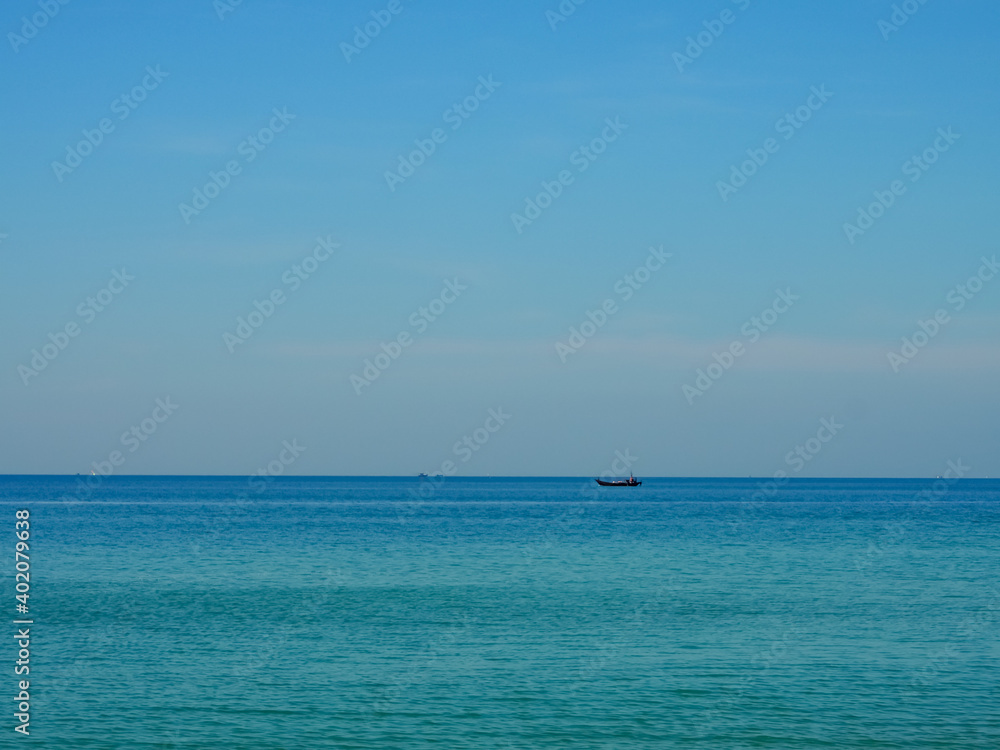 Beachside during the day with clear sky and beautiful beaches in Thailand. Beachside during the day with clear sky and beautiful beaches in Thailand.