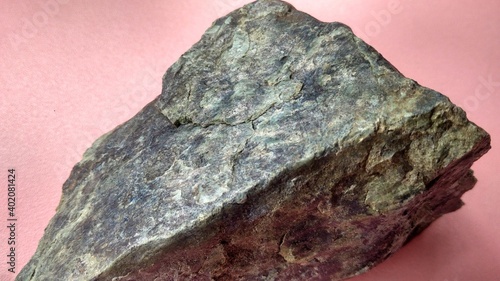 rocks and mineral from geological collection, serpentinite stone before polishing, ring of fire. photo