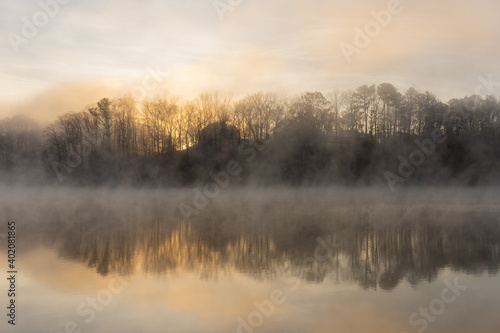 Fog on the water of Lake Lanier in Georgia, USA in winter at sunrise
