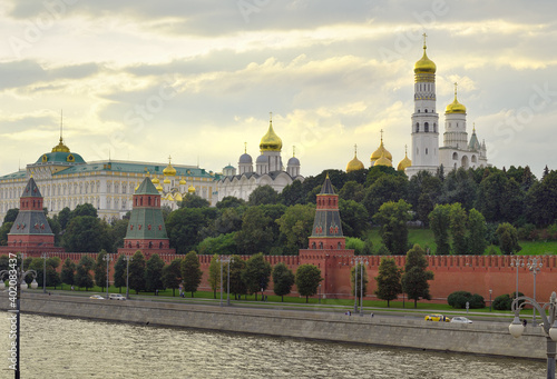 Kremlin embankment of the Moscow Kremlin in the evening. Medieval Russian architecture, white-stone cathedrals, Ivan the Great bell tower, Kremlin Palace. UNESCO monument