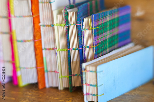 Tableau sur toile spine of notebooks with recycled materials