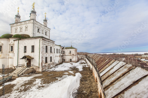 A beautiful shot of the Orthodox Church of All Saints in the Goritsky Assumption Monastery, located in the city of Pereslavl, Russia, in winter photo