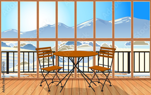 wooden table and chair in the living room with snow forest in the morning background