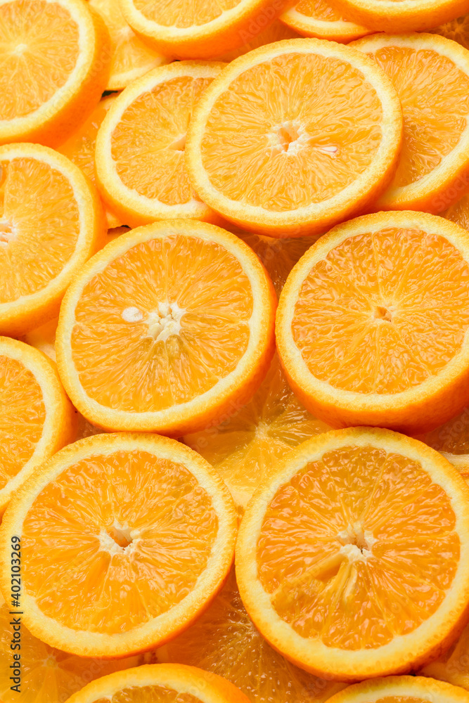 Texture of sliced orange, fresh and healthy fruit, which is rich in juice and vitamin c. Orange background. Texture of sliced orange, fresh and healthy fruit, which is rich in juice and vitamin c. Orange background.