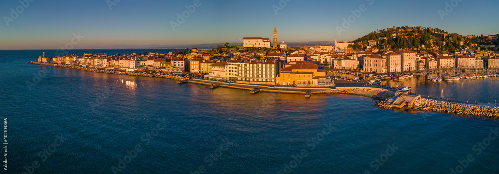  Panoramic aerial view of beautiful town Piran in the golden hour, Slovenia