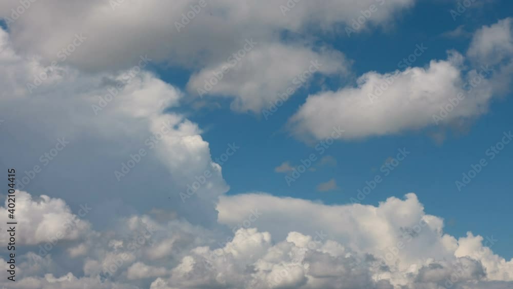 beautiful white clouds floating at the blue sky on a sunny day
beautiful white clouds floating at the blue sky on a sunny day