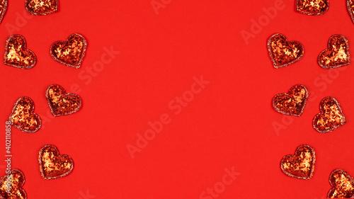 Valentine's Day background with red hearts. Frame for text. Top view