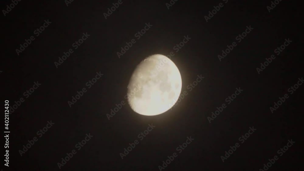 The moon is moving fast in the night black sky The moon is moving fast in the night black sky