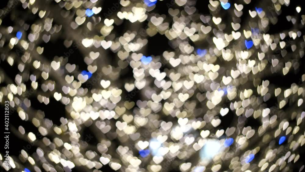 Videos of hearts in blur, they flash white and blue. Festive illumination. February 14. Videos of hearts in blur, they flash white and blue. Festive illumination. February 14.