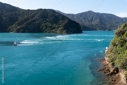 Strong outgoing tide at Te Aumiti/French Pass which separates D'Urville Island from the South Island, New Zealand. The tidal flow at French Pass is the strongest in New Zealand.