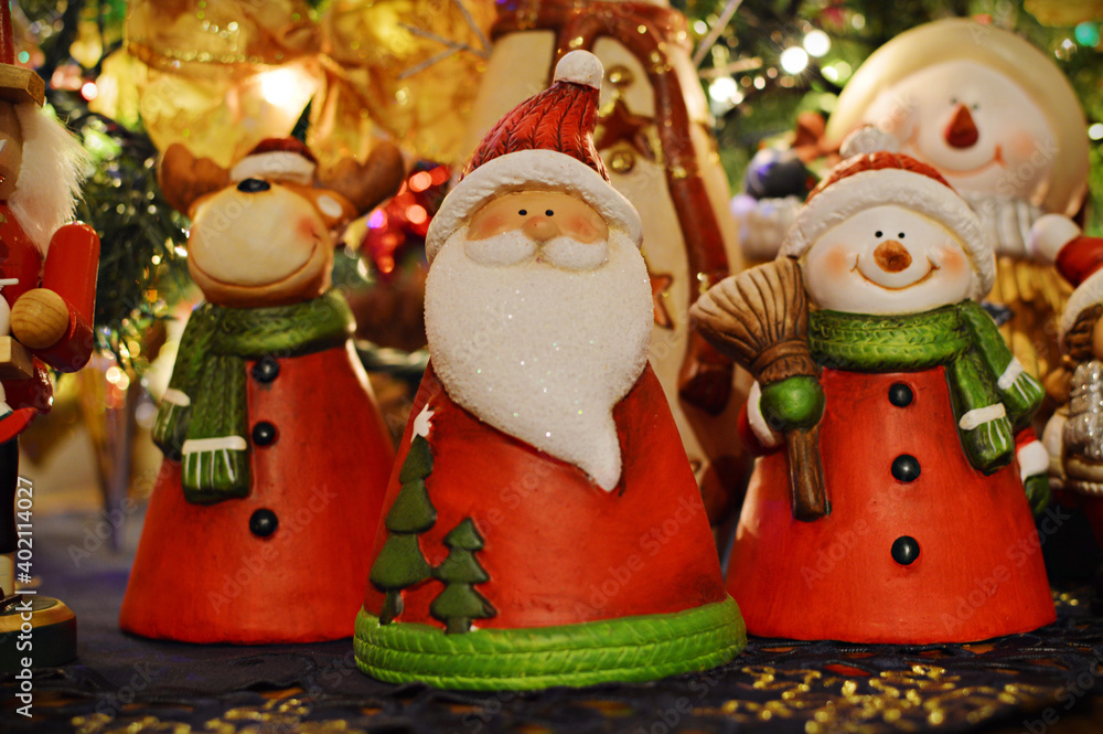 ceramic Christmas figures of Santa Claus, snowman and reindeer 