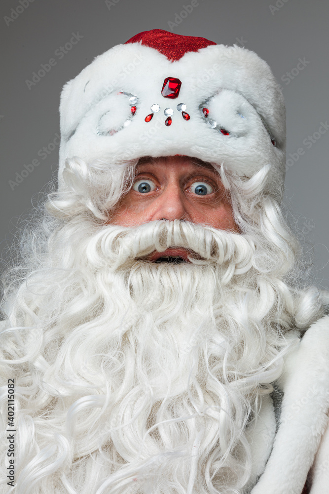 surprised father frost, picture isolated on light grey background surprised father frost, picture isolated on light grey background