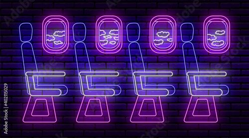 Neon sign in the form of a passenger plane cabin, inside view. Seats and portholes where you can see the sky and clouds. Against a brick wall with a shadow. Blue purple white colors.