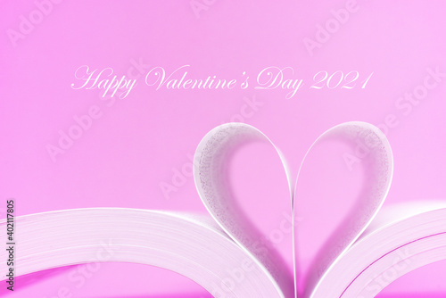 Valentine's Day 2021 , DIY Single heart paper on pink background with Happy valentine's day 2021 word on copy space . Love celebration postcard concept 