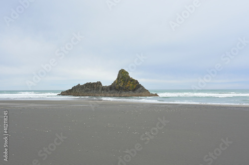 Paratahi Island at Karekare Beach,  Whatipu Scientific Reserve photo