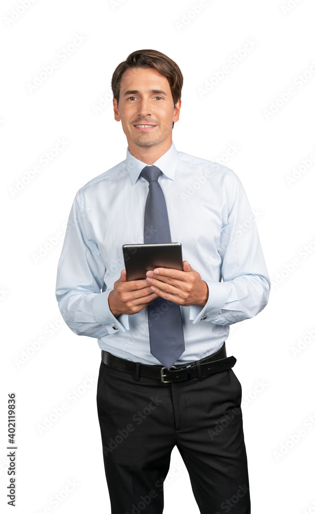 Businessman in blue shirt and tie standing with tablet in hands, isolated over white background. Caucasian manager smiling, looking at the camera Businessman in blue shirt and tie standing with tablet in hands, isolated over white background. Caucasian manager smiling, looking at the camera