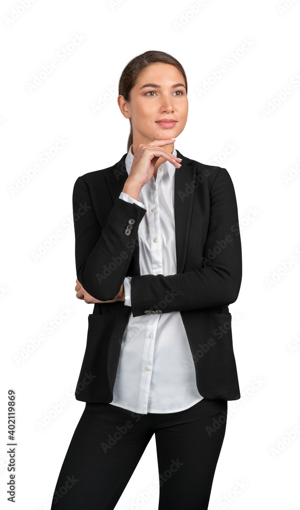 Businesswoman in black suit standing hand to chin, isolated over white background. Young female manager thinking arms crossed, looking away, pensive look Businesswoman in black suit standing hand to chin, isolated over white background. Young female manager thinking arms crossed, looking away, pensive look