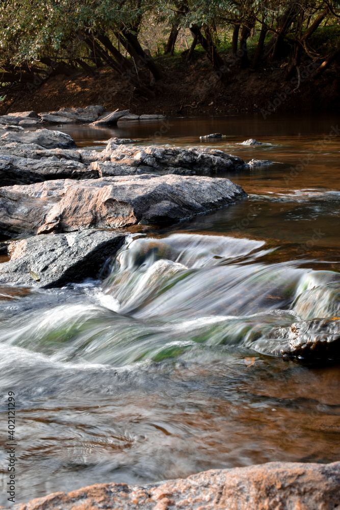 waterfalls, dam shutter and river bed in india kerala thenmala kerala eco tourism projects. beauty of Gods own country