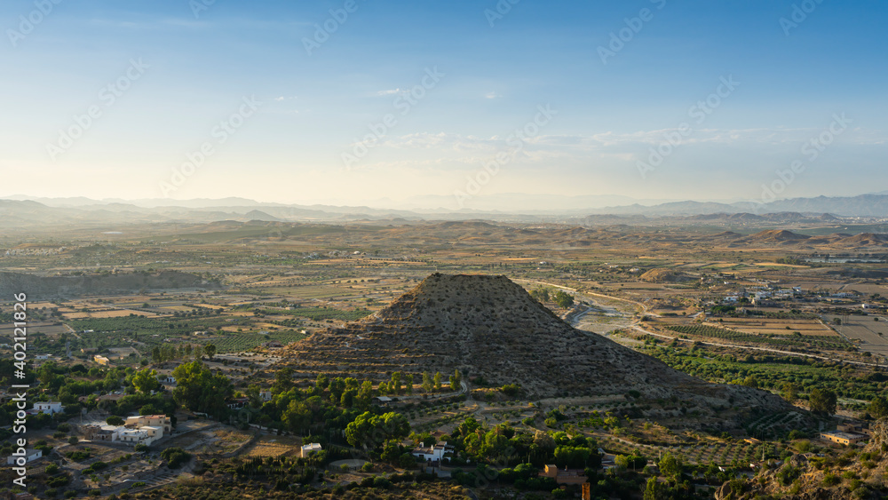 Panoramic landscape at sunset in Almeria near the town of Mojacar, with clear blue skies.