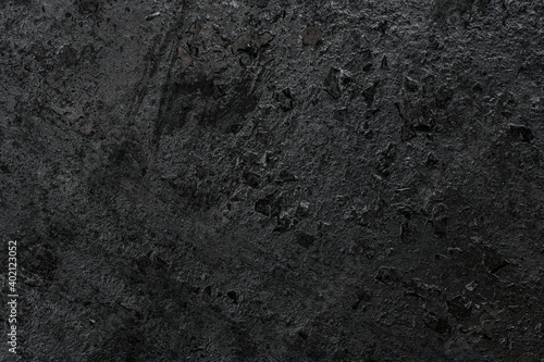old dark and dirty stone graphite plate background. photo