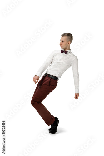 Icon. Happy young man dancing in casual clothes or suit, remaking legendary moves and dances of celebrity from culture history. Isolated on white. Action, motion, fame concept. Creative occupation. © master1305