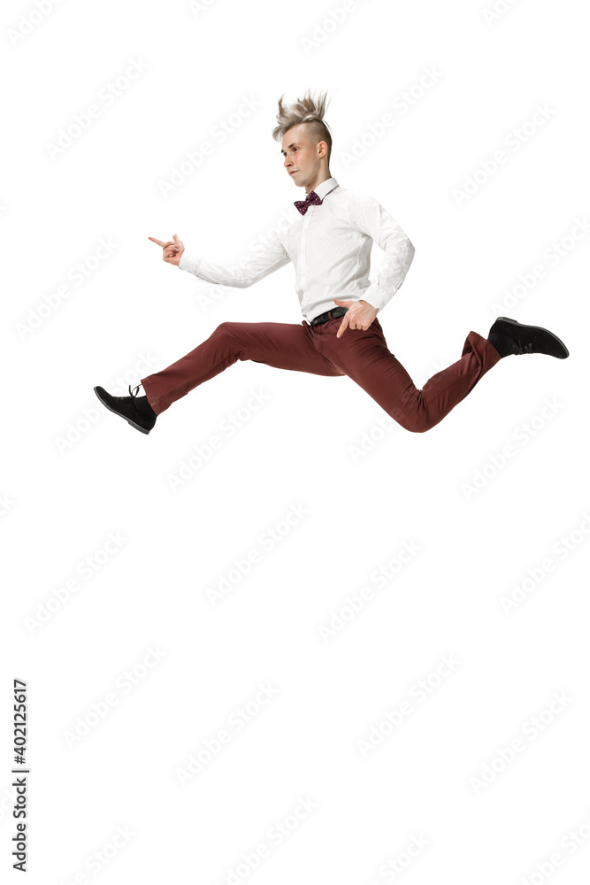 Rockstar. Happy young man dancing in casual clothes or suit, remaking legendary moves and dances of celebrity from culture history. Isolated on white. Action, motion, fame concept. Creative occupation Rockstar. Happy young man dancing in casual clothes or suit, remaking legendary moves and dances of celebrity from culture history. Isolated on white. Action, motion, fame concept. Creative occupation