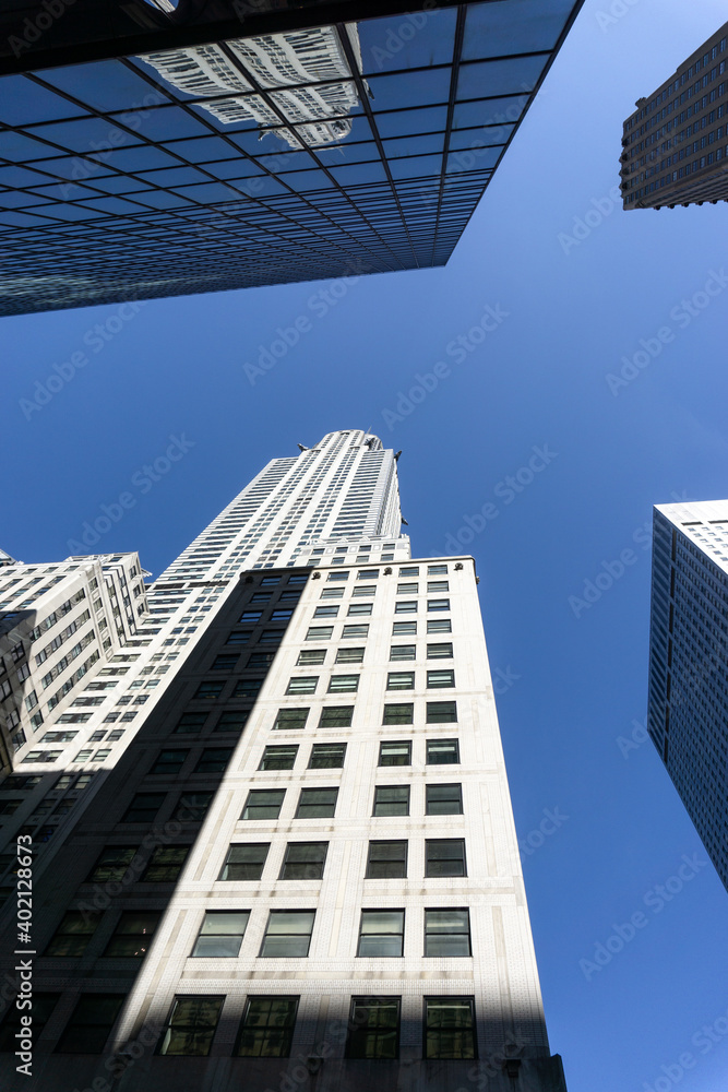 Look up at buildings on the streets of New York
